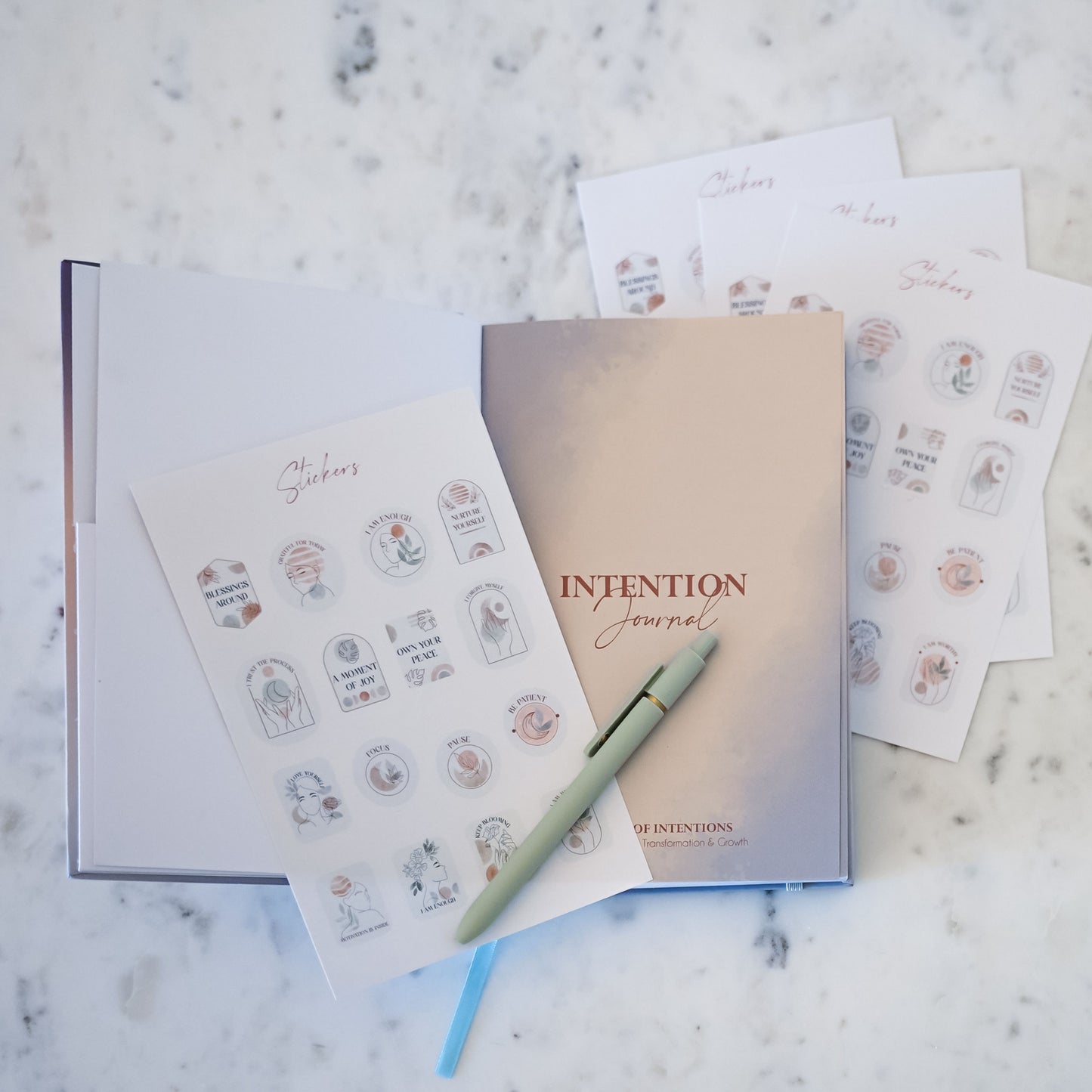 Open 365 intention journal with stickers to add a creative and personal touch.